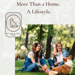 two women with a dog in a park