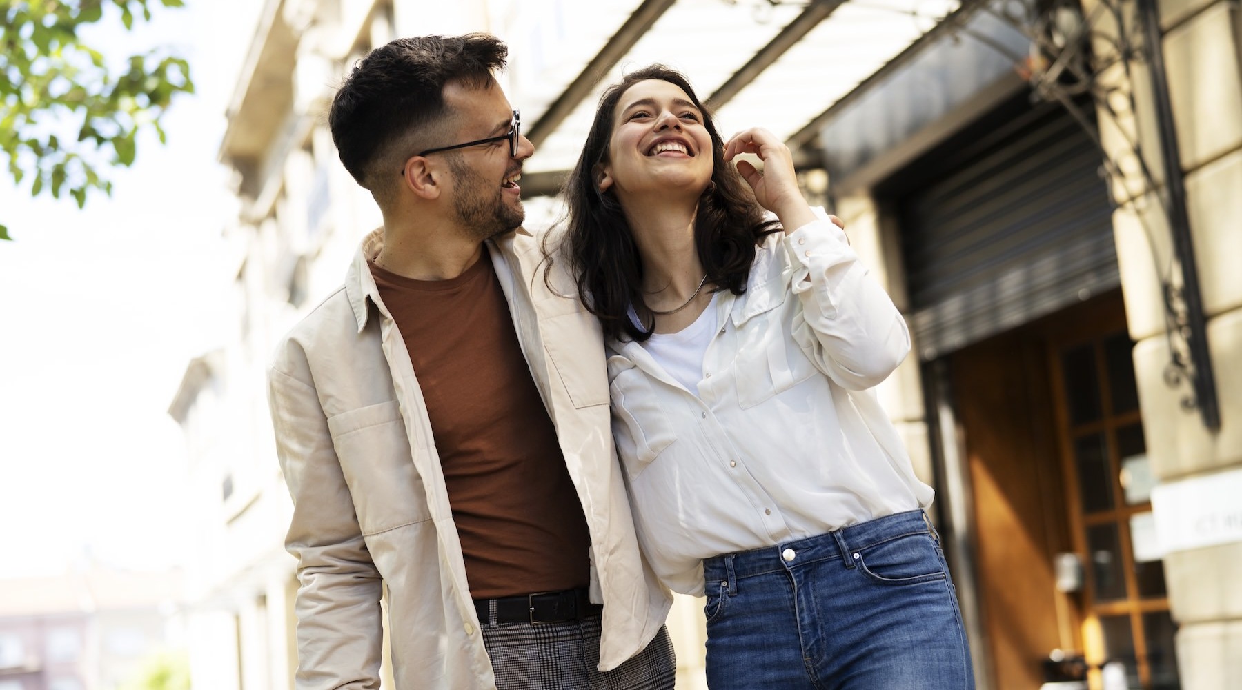 a man and woman smiling