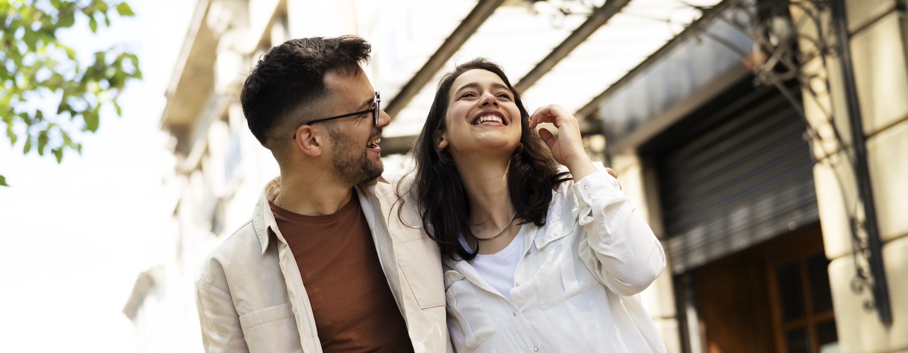 a man and woman smiling